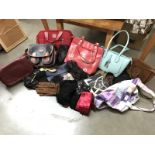 A quantity of various handbags