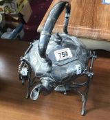 A Victorian silver plated spirit kettle and a napkin holder
