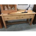 A 2 drawer pine butchers table