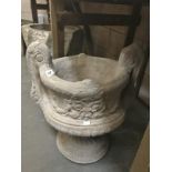 A decorative two handled urn