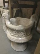 A decorative two handled urn