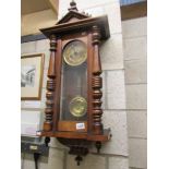 A mahogany Vienna wall clock.