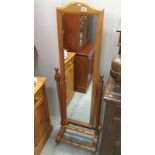 A pine wood framed cheval mirror