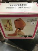 A 1970's hair dryer with original box