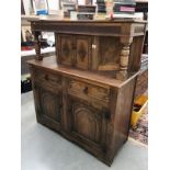 A carved wood buffet
