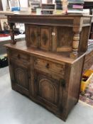 A carved wood buffet