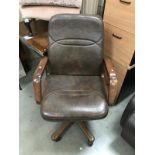 A brown leather office chair