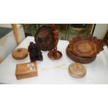 7 items of woodenware including figure, bowls, trinket boxes & a bone glove stretcher etc.