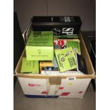 A box containing Subutteo & other games