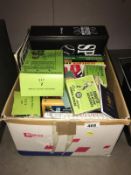 A box containing Subutteo & other games