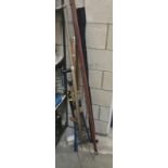 A quantity of garden tools including branch loppers,