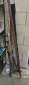 A quantity of garden tools including branch loppers,