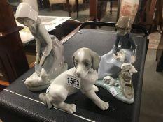 3 NAO figures including Girl with rabbit, girl with lamb and a dog.