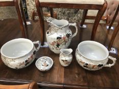 A pair of chamber pots, a jug and soap dish etc.