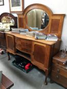 A 2 drawer, 2 door side cabinet with plate shelf, curved legs,
