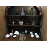 A mixed lot including a stoneware pestle & mortar, paper weights and flower ornaments etc.