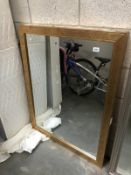 A large gilt framed mirror