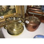A copper kettle & brass kettle