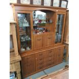A tall modern wooden display cabinet
