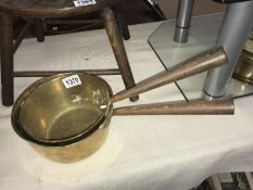 2 Victorian brass saucepans.