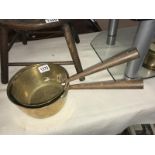 2 Victorian brass saucepans.