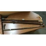 4 wooden walking canes