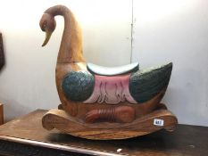 A partially painted carved wood waterfowl child's rocking chair (A/F been repaired)