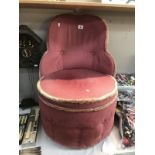 A pink draylon tub chair