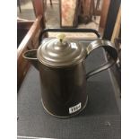 A copper lidded jug.