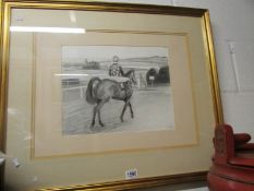 A charcoal drawing of a horse and jockey at Hexham racecourse signed by Kathleen M Sisterson M.