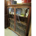 An astragal glazed display cabinet.