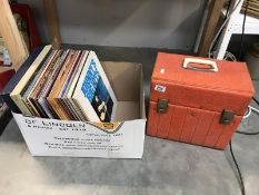 A case and box of LP records