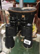 A pair of horse racing binoculars (Prinz 10 x 50) & a case with compass & horse racing badges