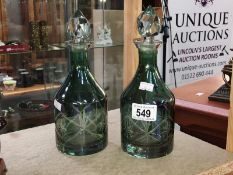 2 green cut glass decanters