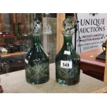 2 green cut glass decanters