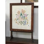 A framed & galzed floral embroidery fire screen