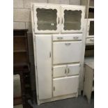 A 1950's/1960's white painted kitchen cabinet