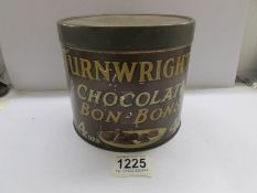 A Turnwrights chocolate bon bon tin.