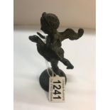 A 19th century winged cherub with bird.