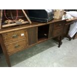 A mahogany inlaid sideboard.