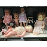 A quantity of vintage dolls etc.