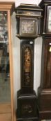 An oriental style lacquered long case clock.