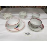 A selection of 18/19th century porcelain being 2 tea bowls with saucers and 3 other tea bowls