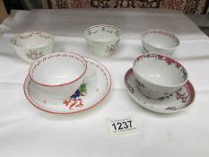 A selection of 18/19th century porcelain being 2 tea bowls with saucers and 3 other tea bowls