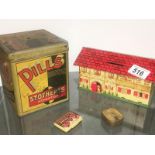 A vintage pills Stotherts tin an old DBF money box & 2 tins of record needles