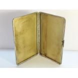 A silver cigarette case Hallmarked Birmingham 1948/9 (weight 7.