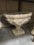 An acanthus urn decorated with acanthus leaves