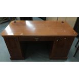 A modern twin pedestal desk