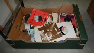 A box of 45rpm records