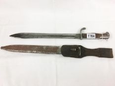 A German sword bayonet 1898/05 model with markings including maker Alex Coppel Solingen with